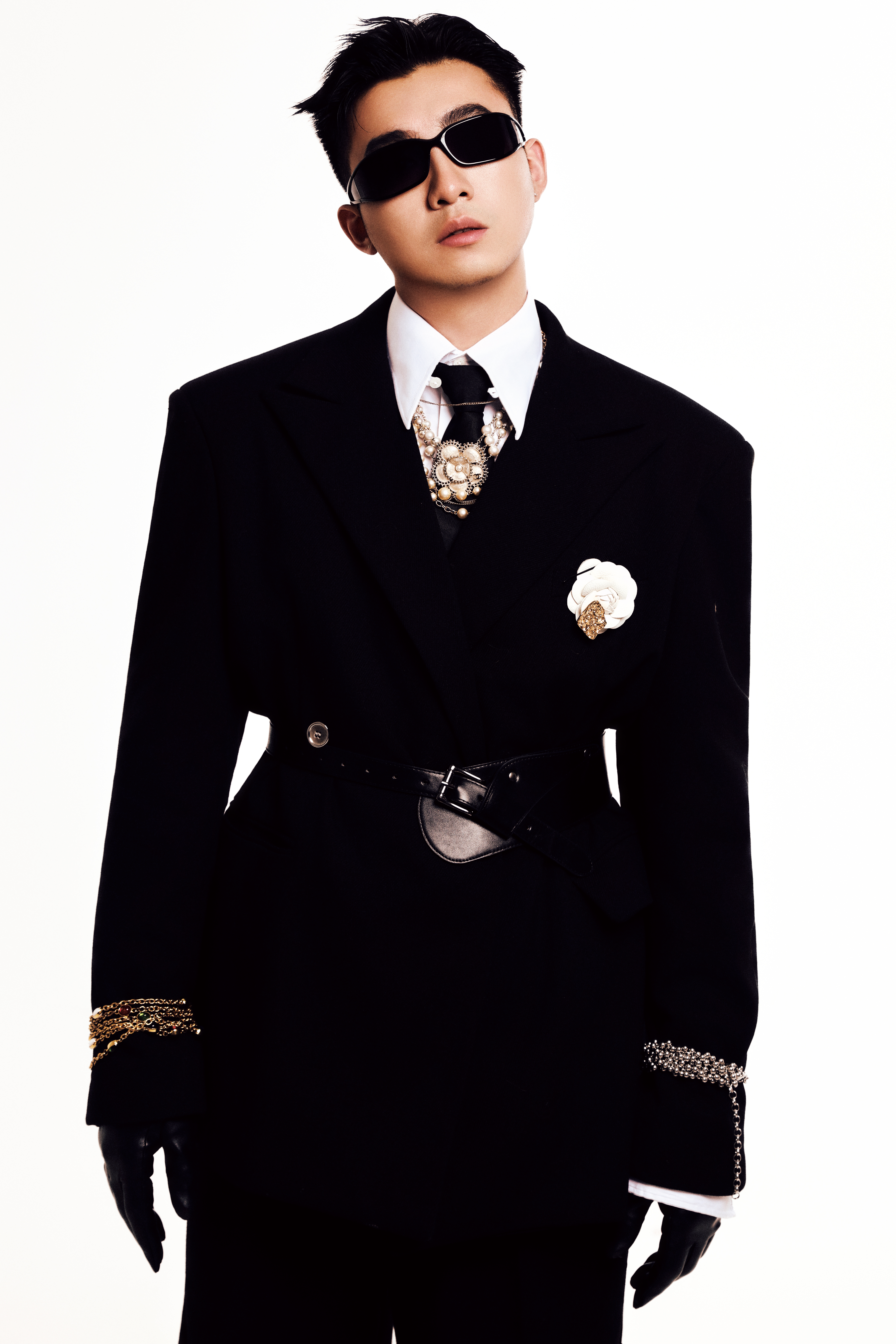 Studio portrait of Chason Fu in black suit